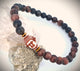 Pulsera elástica piedra natural dije buda.