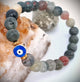 Pulsera elástica piedra natural dije ojo.