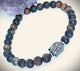Pulsera elástica piedra natural  dije buda.