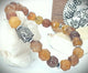 Pulsera elástica piedra natural dije buda.