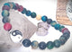 Pulsera elástica piedra natural dije yin yang.